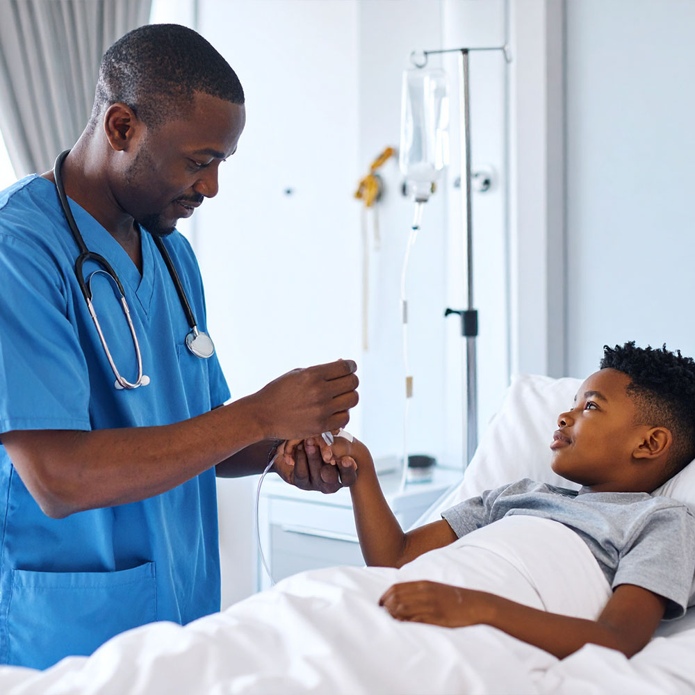 Male Nurse with a Young Patient